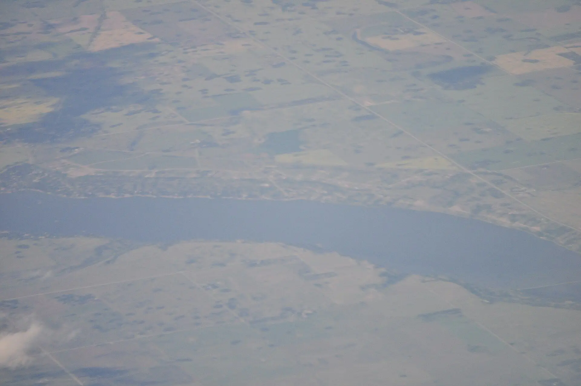 Aerial view of Last Mountain Lake and surrounding farmland