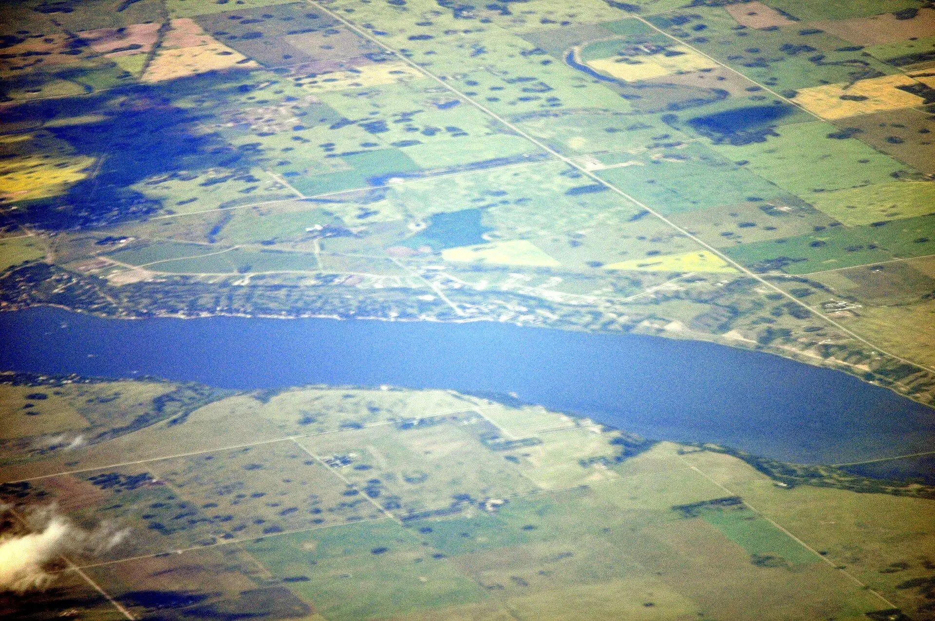 Aerial view of Last Mountain Lake and surrounding farmland